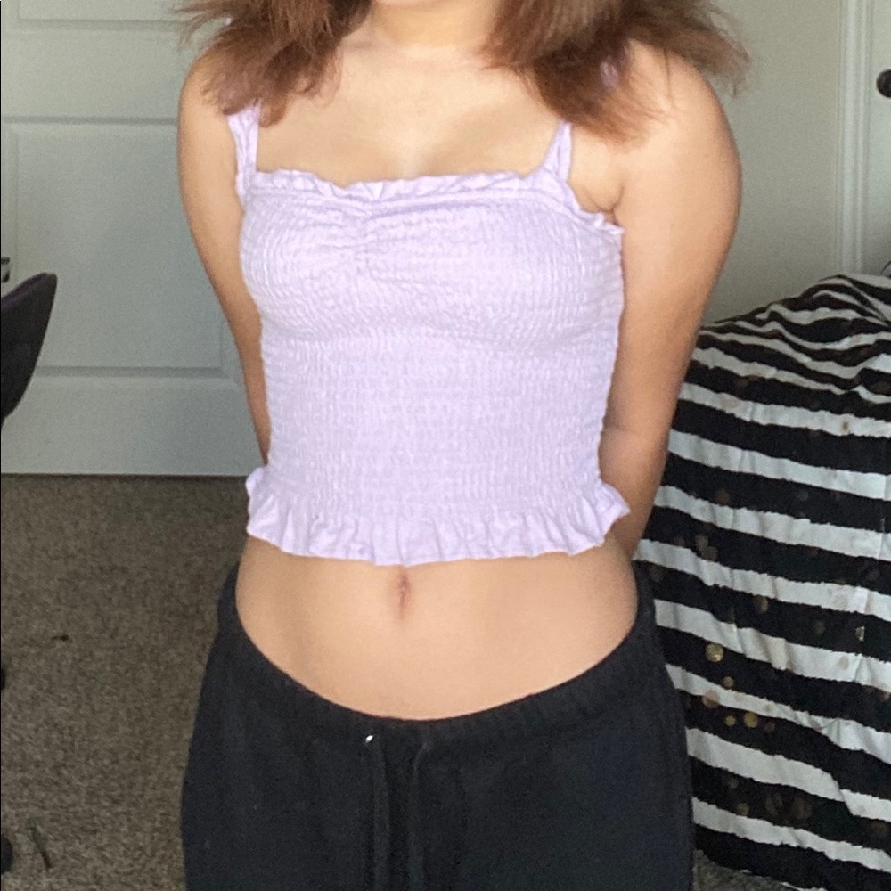 a purple ruffle crop top